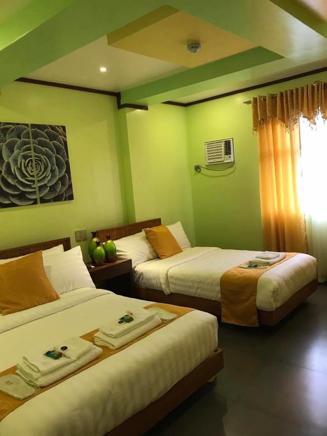 Royal Mansion Hotel Tabaco Buitenkant foto