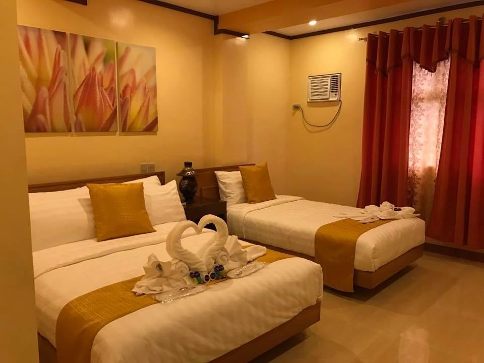 Royal Mansion Hotel Tabaco Buitenkant foto