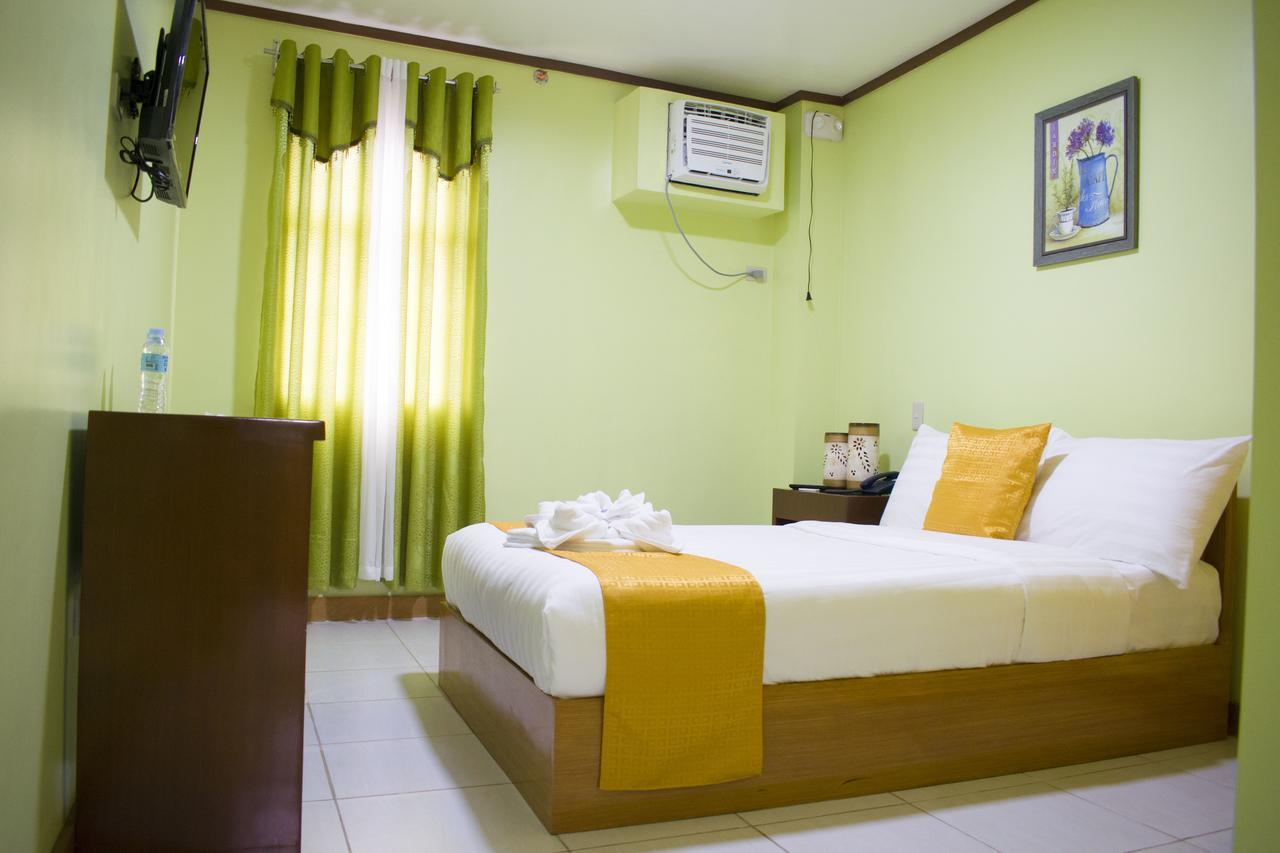 Royal Mansion Hotel Tabaco Buitenkant foto