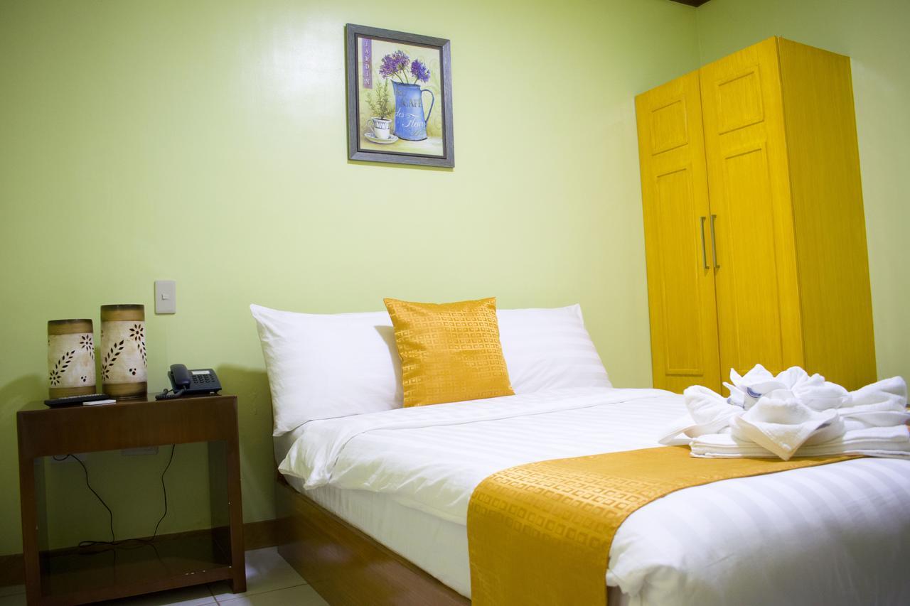Royal Mansion Hotel Tabaco Buitenkant foto