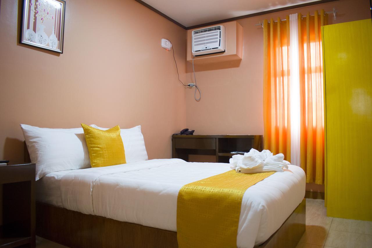 Royal Mansion Hotel Tabaco Buitenkant foto
